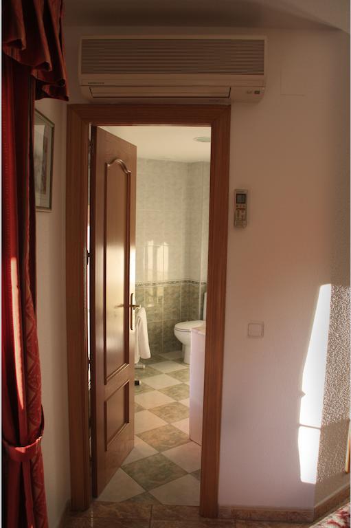 Hostal González Guadarrama Quarto foto